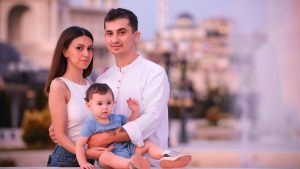 Charming family enjoying a day outdoors in Ankara, capturing delightful emotions.